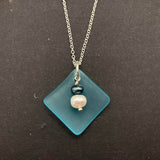 The "Balance of Life" - a Hawaii lifestyle and mentality, Curved Teal sea glass Necklace with White and Purple natural pearls