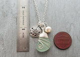 Handmade in Hawaii, Wire wrapped Genuine surf tumbled natural sea glass necklace. sand dollar charm, Fresh water pearl, Beach jewelry.