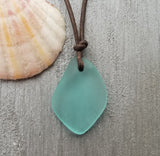 Handmade in Hawaii, leather cord unisex Puff Aqua sea glass necklace, unisex jewelry, (Hawaii Gift Wrapped, Customizable Gift Message)…