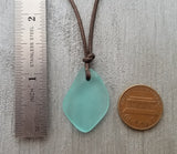 Handmade in Hawaii, leather cord unisex Puff Aqua sea glass necklace, unisex jewelry, (Hawaii Gift Wrapped, Customizable Gift Message)…
