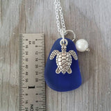Design and handmade in Hawaii, Cobalt blue sea glass necklace, Sea turtle charm, Natural Pearl, "September Birthstone"