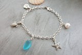 Handmade in Hawaii, Multiple charms blue sea glass chain bracelet, Natural pearl, Hawaiian jewelry