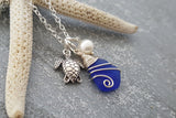 Handmade in Hawaii, Wire wrapped Genuine surf tumbled natural sea glass. Sea turtle charm, Fresh water pearl, Sea glass jewelry