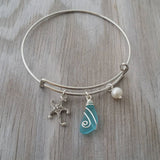 Handmade in Hawaii, wire wrapped blue sea glass bracelet, Sea glass jewelry, Starfish charm, Fresh water pearl, Hawaiian jewelry.